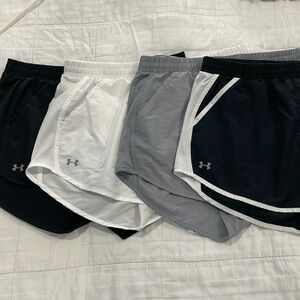 Set of 4 pairs underamour shorts with built in underwear